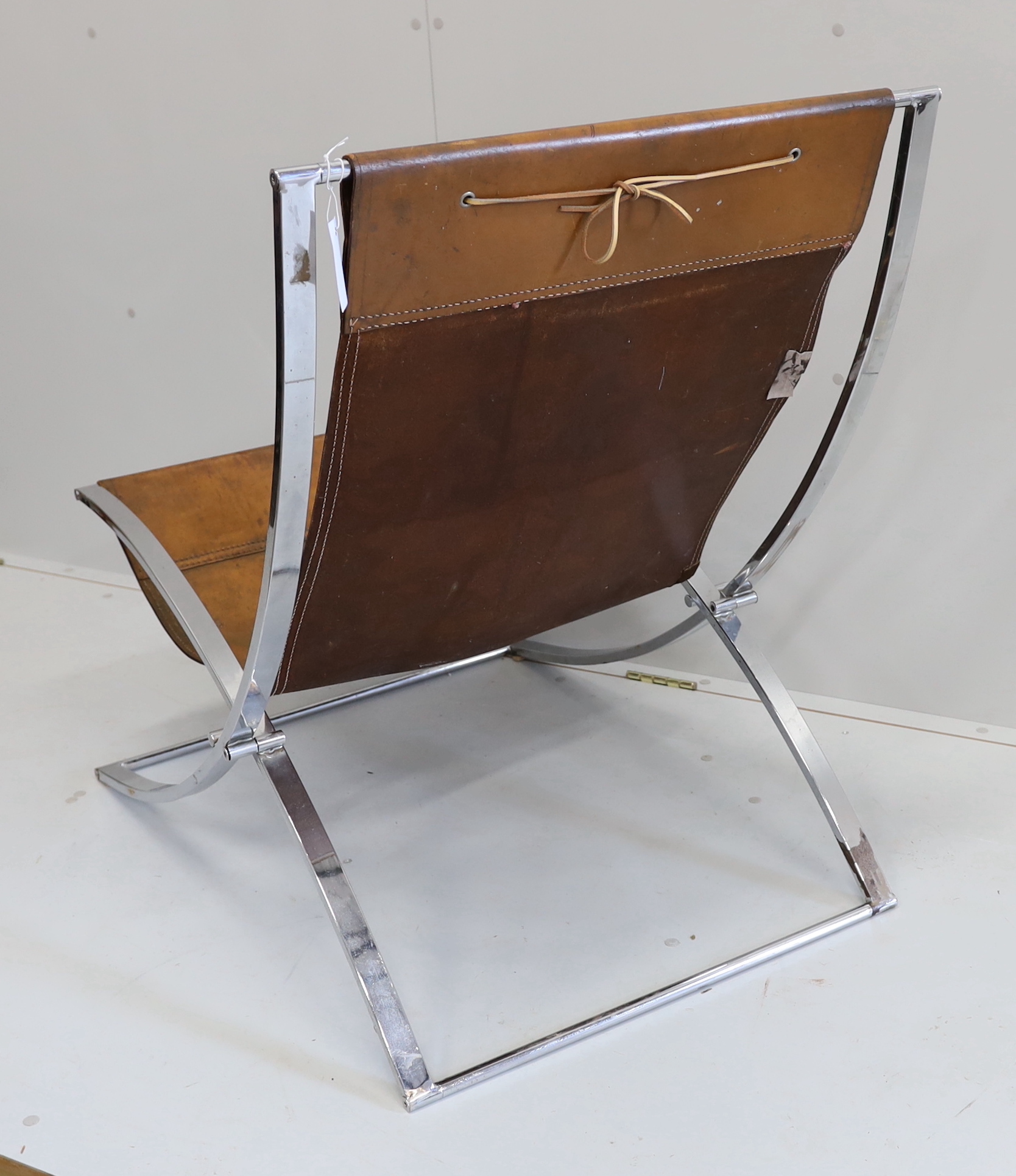 A 1970's leather and chrome armchair by Marcho Cuno, width 67cm, depth 100cm, height 90cm